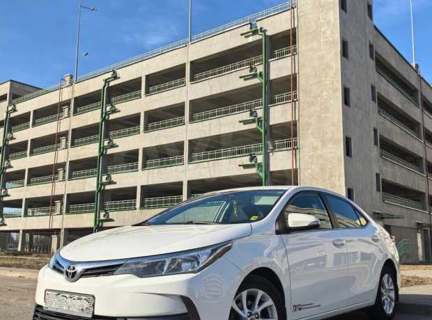 Toyota Corolla XI (E170) Рестайлинг